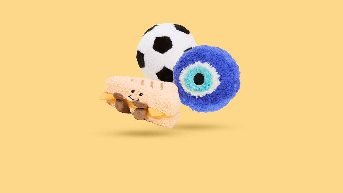 Image of Soccer Ball Warmies, Avocado Warmies, Evil Eye Warmies.