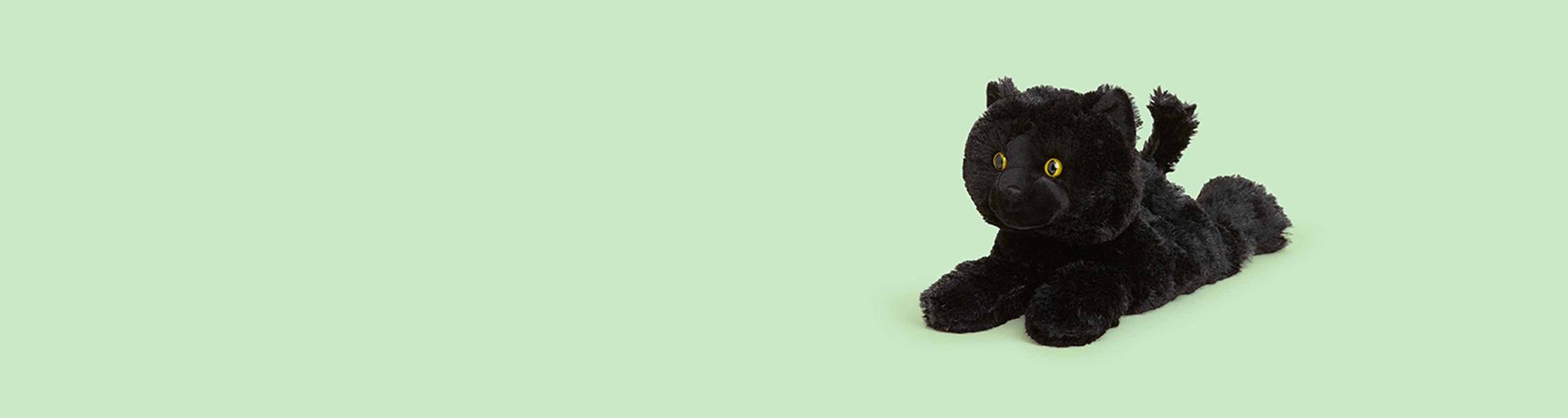 Image of Calico Cat Warmies and Laying Down Gray Cat Warmies side by side.