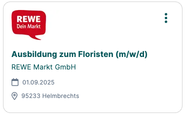 Floristin vor Blumenladen